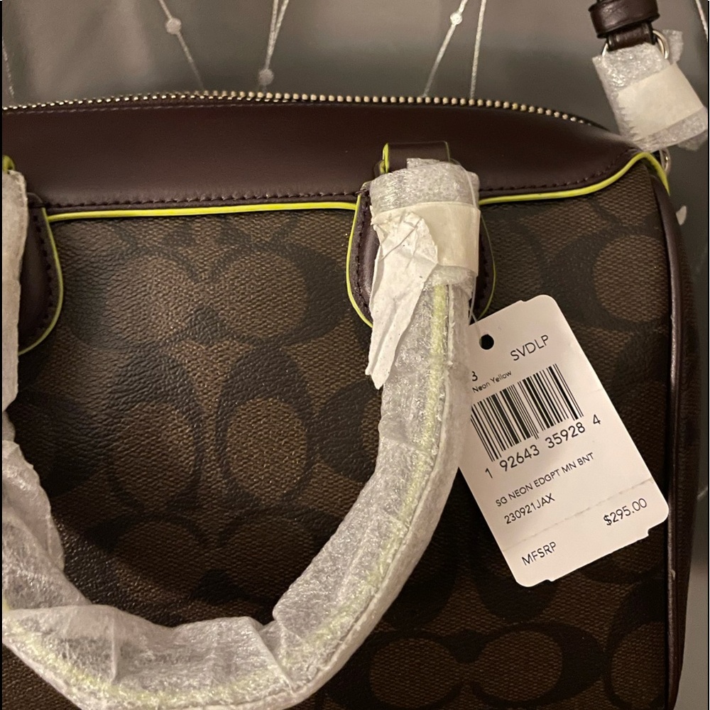 NWT Coach Purse. Brown with neon green piping.
